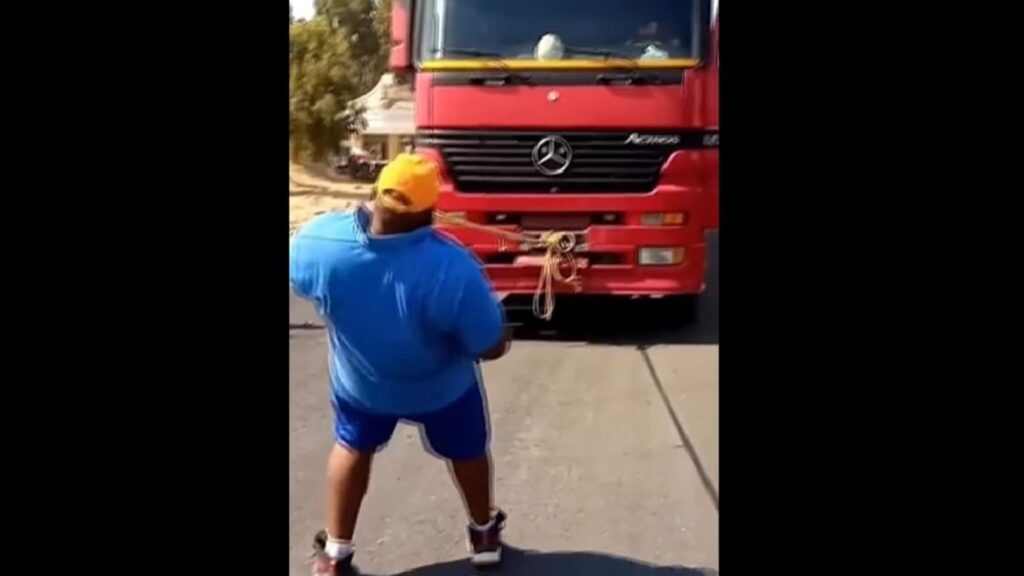 Heaviest road vehicle pulled with teeth