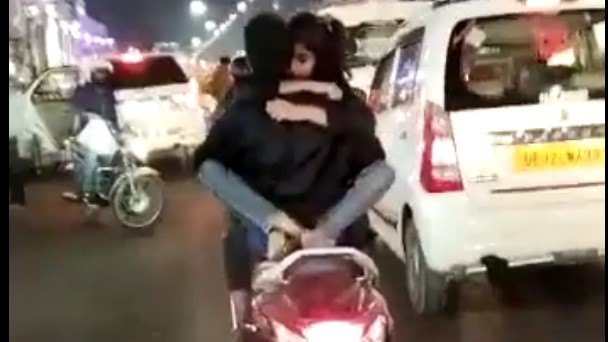 couple romance on two wheeler