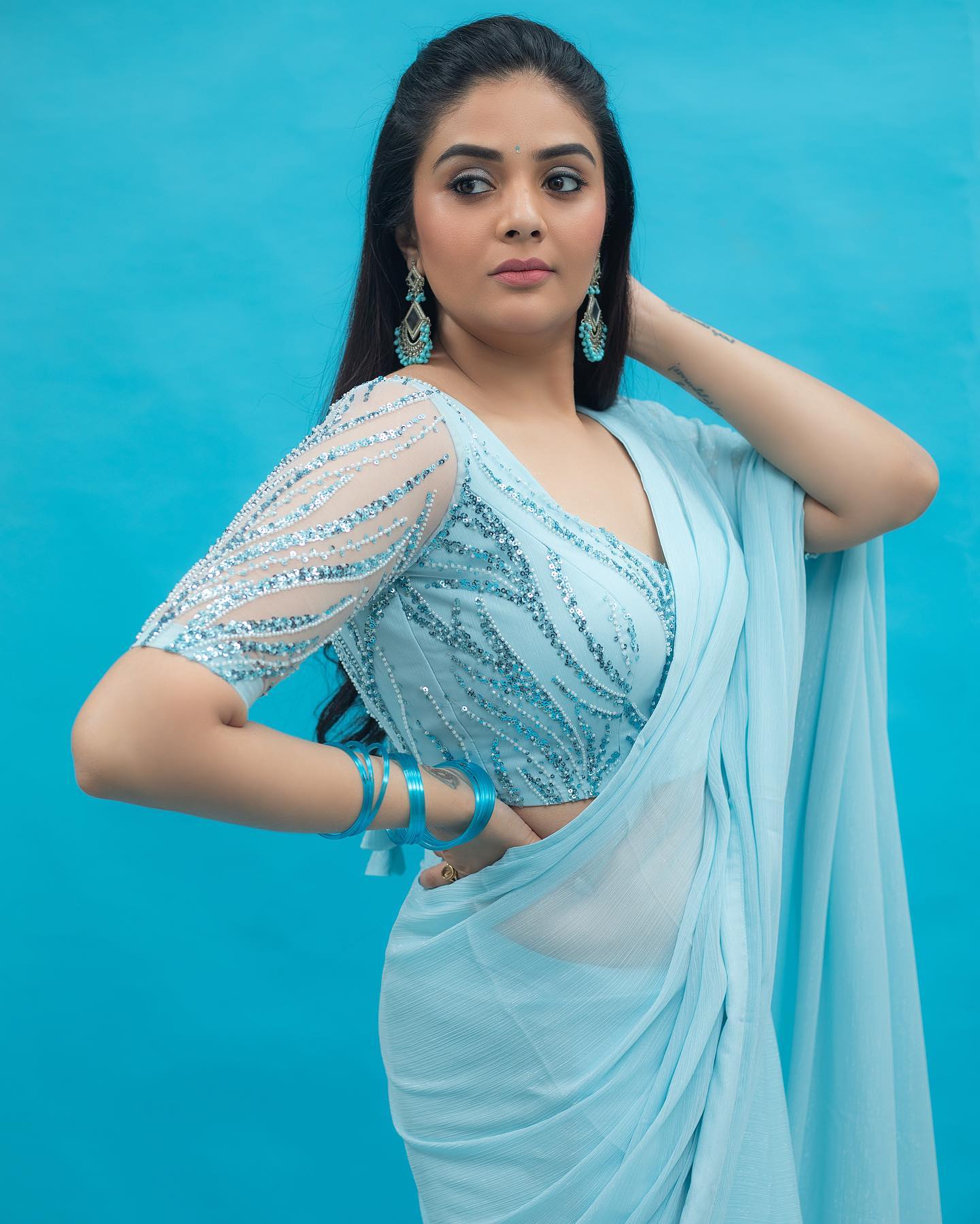 sreemukhi blue color saree stills